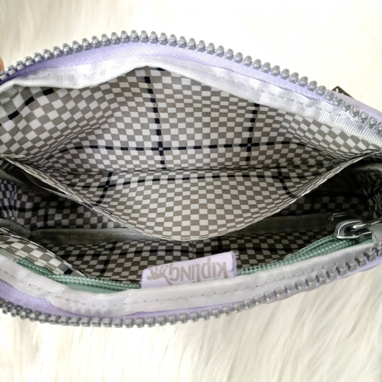 KIPLING กระเป๋าสตางค์ซิปรอบ ใบยาว Seoul up clutch & sling bag