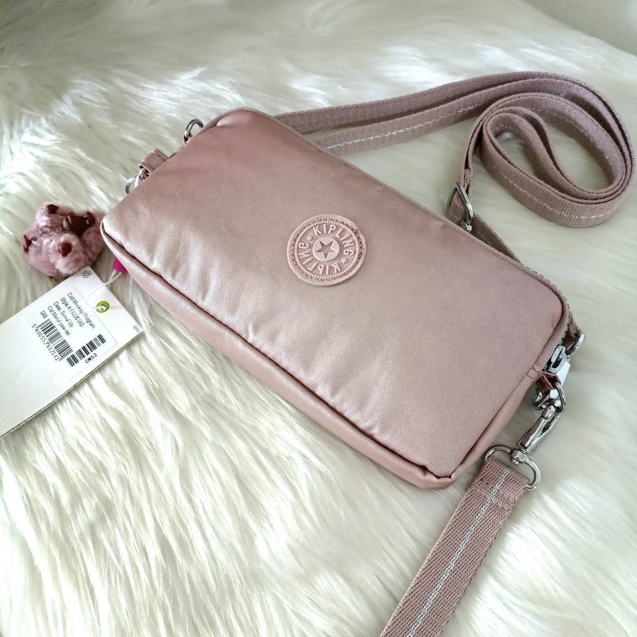 KIPLING กระเป๋าสตางค์ซิปรอบ ใบยาว Seoul up clutch & sling bag