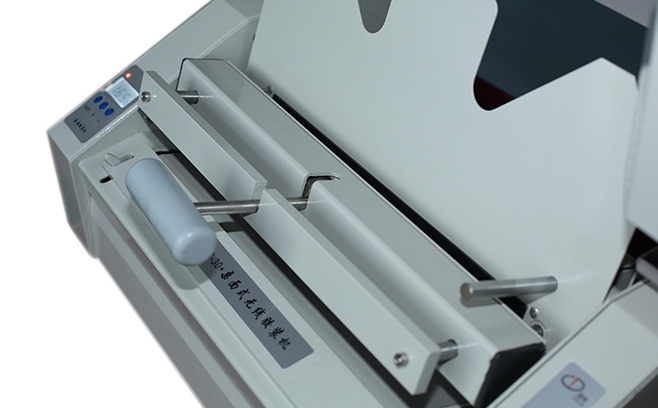 เครื่องเข้าเล่มสันกาวอัตโนมัติระบบดิจิตอลยี่ห้อDocon รุ่น DC30+