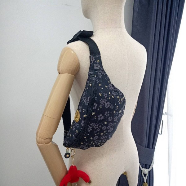 KIPLING กระเป๋าสะพาย กระเป๋าคิปลิ้ง Pac Man Fresh Waist Pack