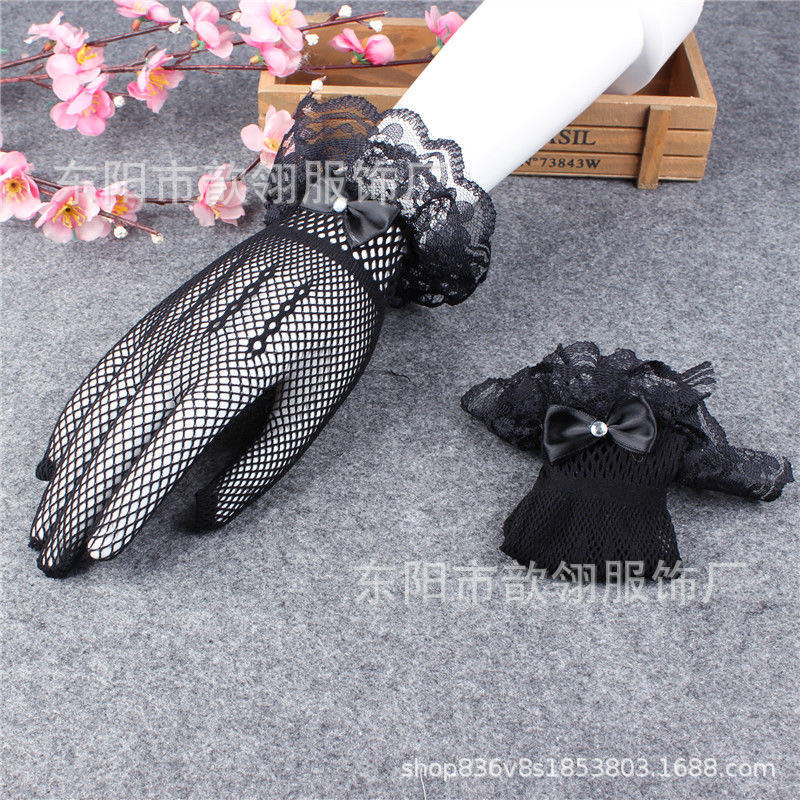 ถุงมือตาข่ายสีดำ โบว์ติดเพชร ลูกไม้ ลายลูกไม้สวย ยืดตามขนาดมือ เหมาะเด็กโตถึงผู้ใหญ่