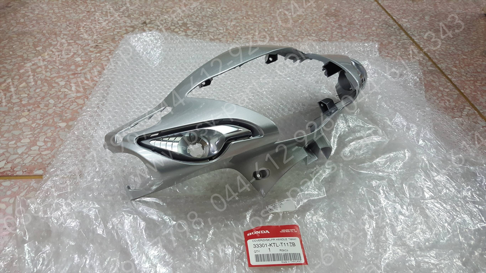 เสื้อไฟหน้าตัวหน้า WAVE 100/05 ดิสก์เบรค แท้ๆ สีบรอนซ์ (NH411) 33301-KTL-T11ZB