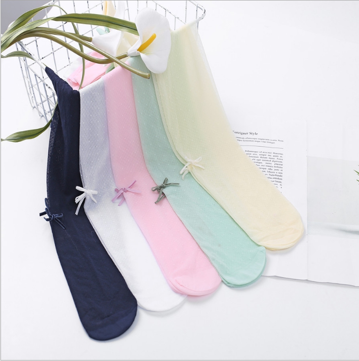 ถุงน่องเด็ก สีกรมแบบโปร่ง ลายจุดน่ารักๆ ติดโบว์น่ารัก