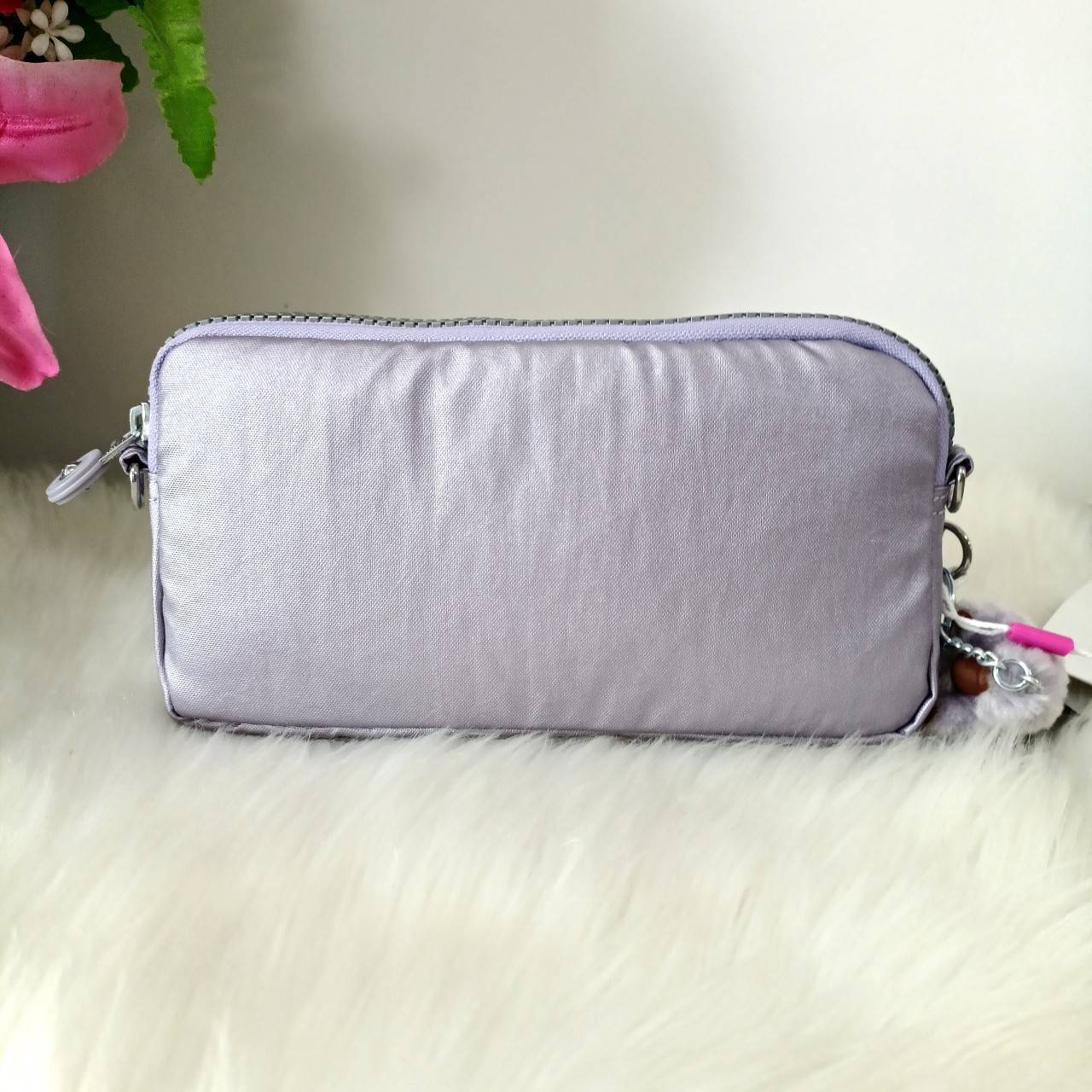 KIPLING กระเป๋าสตางค์ซิปรอบ ใบยาว Seoul up clutch & sling bag