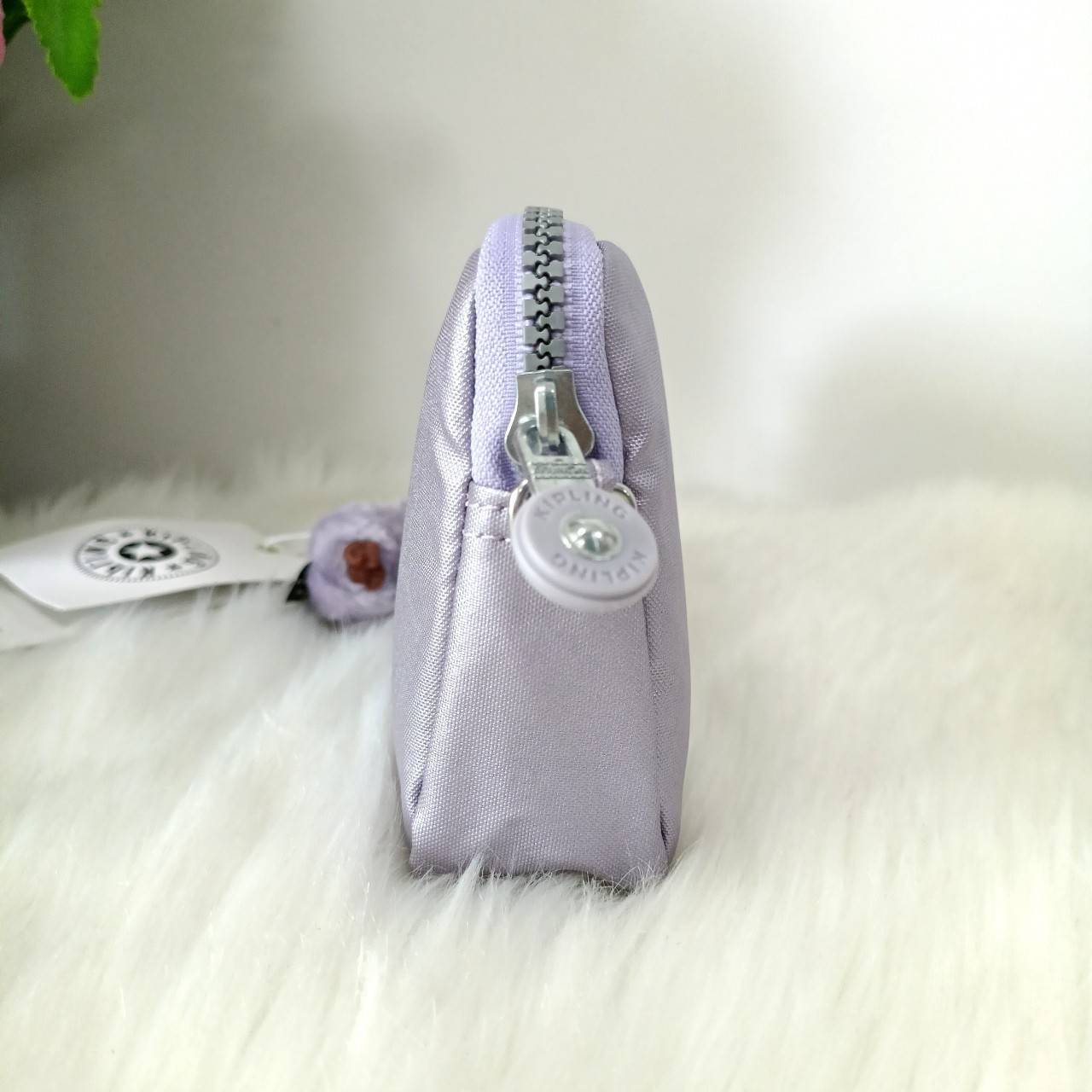 KIPLING กระเป๋าสตางค์ซิปรอบ ใบยาว Seoul up clutch & sling bag