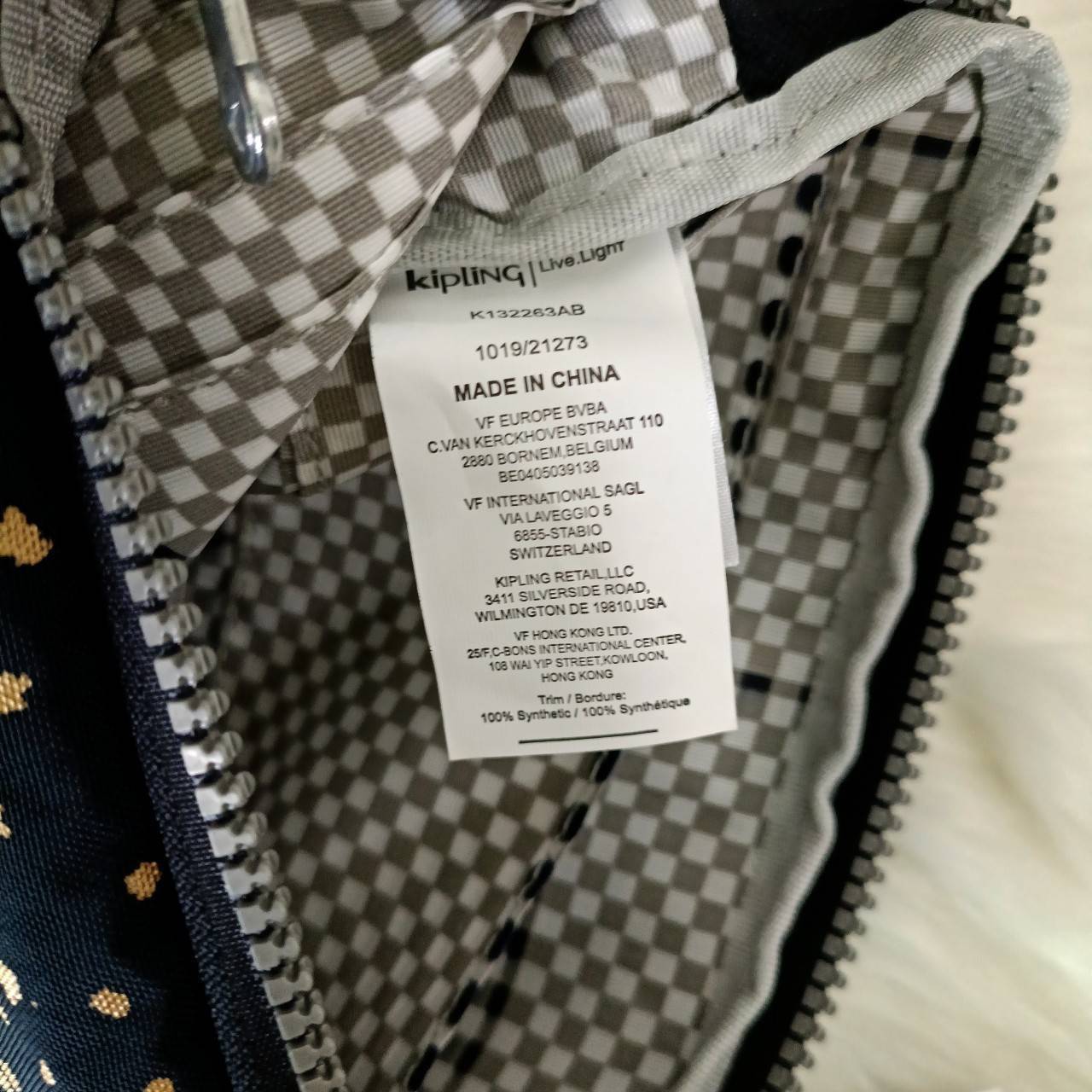 KIPLING กระเป๋าสตางค์ซิปรอบ ใบยาว Seoul up clutch & sling bag