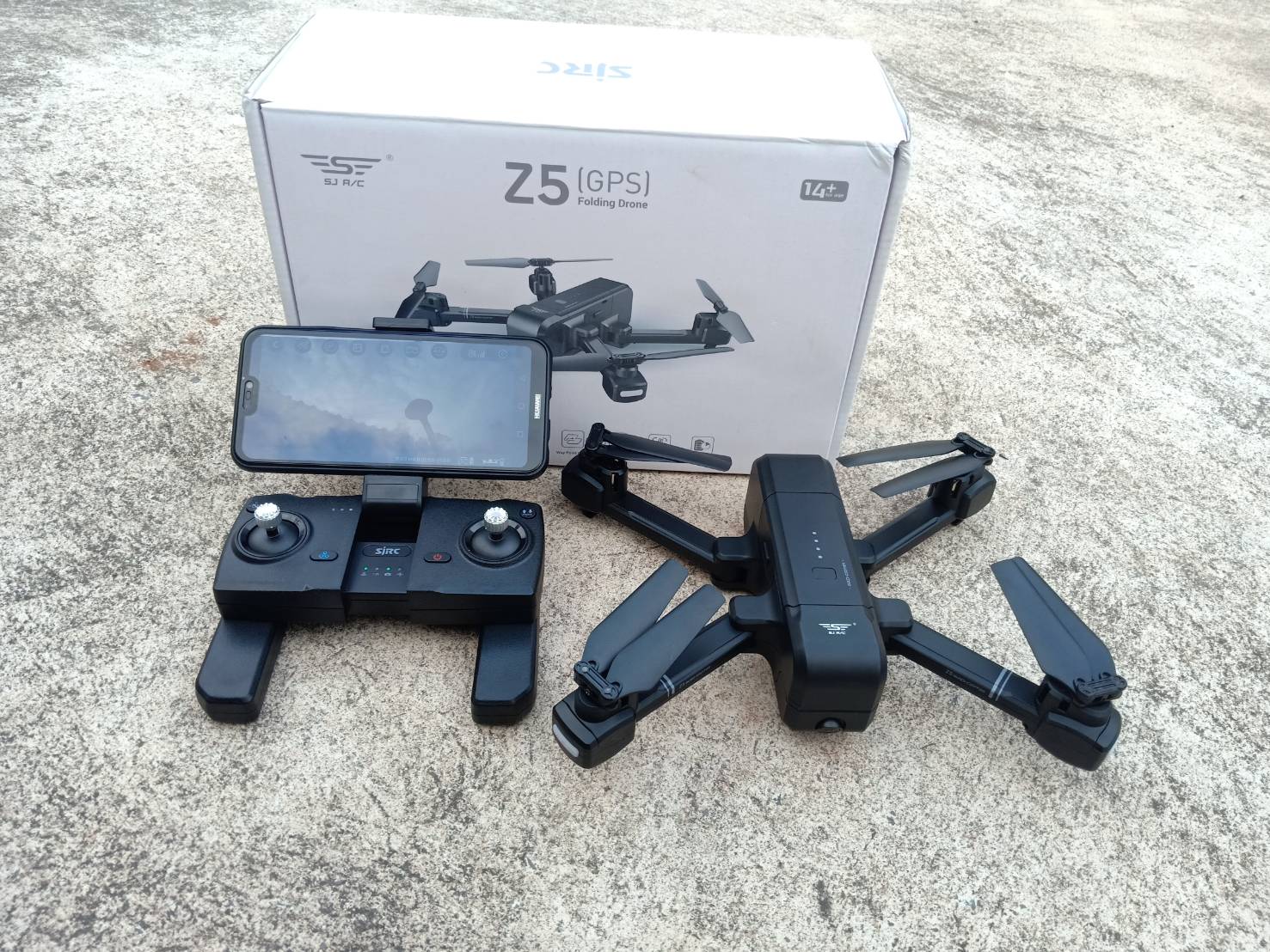 โดรนบังคับวิทยุ SJRC Z5 WIFI FPV 1080P CAMERA มีระบบล๊อคตำแหน่ง บินกลับเอง หมายเตุเป็นสเกลเดียวกันกับรุ่น MJX X103