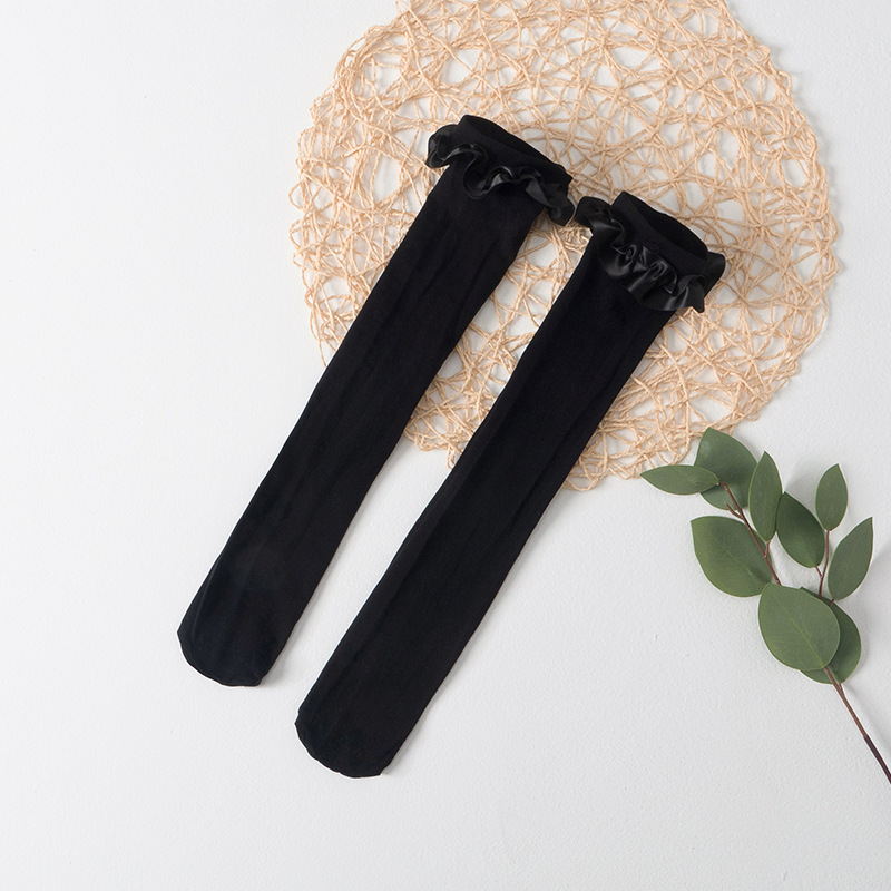 ถุงน่องยาวเลยเข่า สวยน่ารักสไตล์เกาหลี สีแดง สีดำ สีขาว แบบขนาดฟรีไซส์ 3-15 ปี