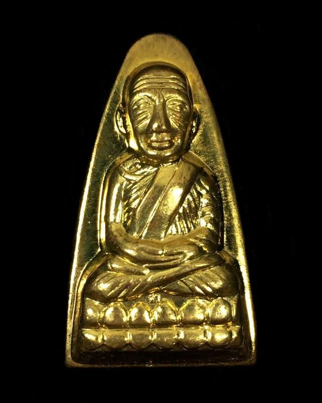 พระหลวงปู่ทวด วัดช้างให้ จ.ปัตตานี รุ่น ๑๐๑ ปี อาจารย์ทิม ปี ๒๕๕๖ พิมพ์หลังหนังสือใหญ่ เนื้อทองระฆัง หมายเลข ๖๐๒