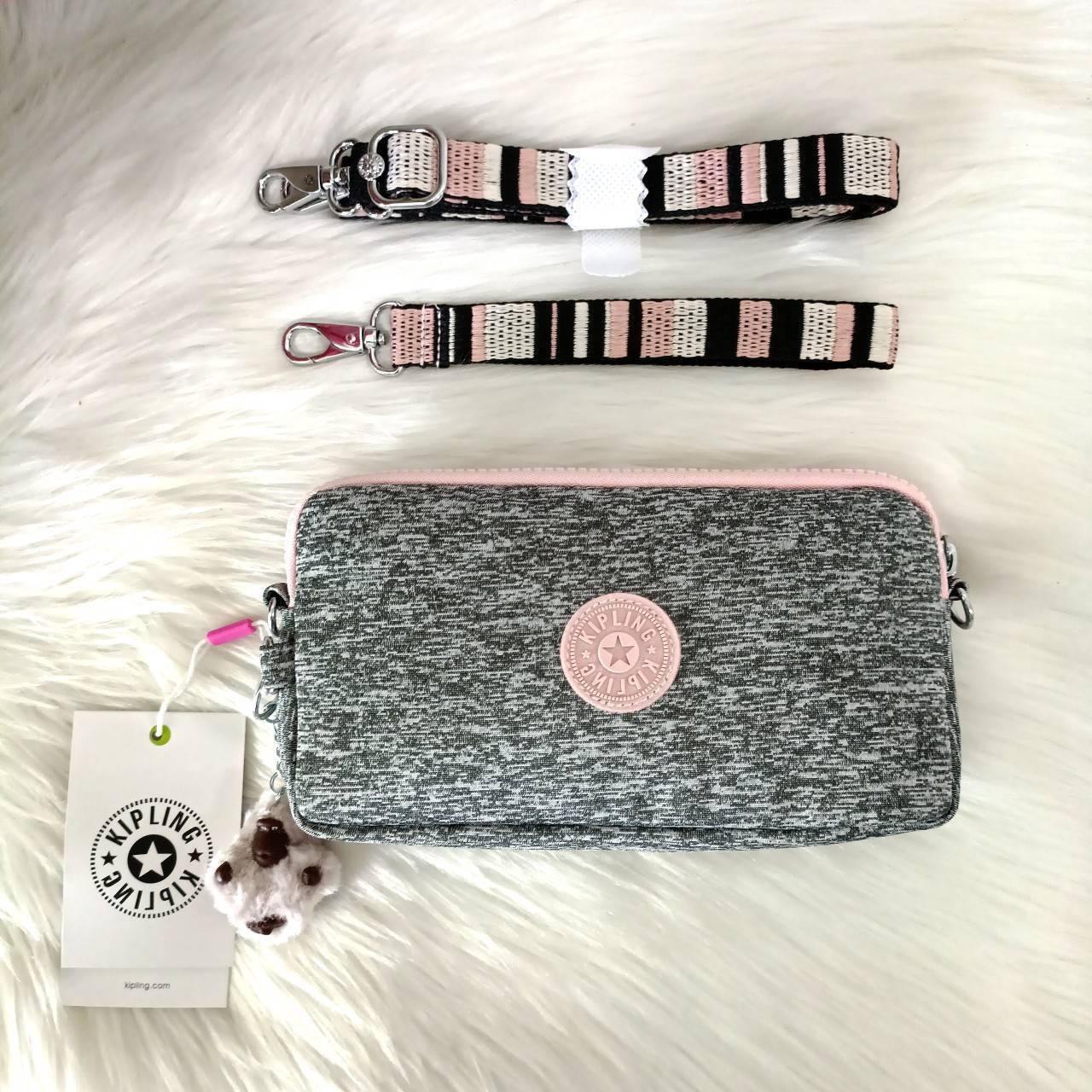 KIPLING กระเป๋าสตางค์ซิปรอบ ใบยาว Seoul up clutch & sling bag