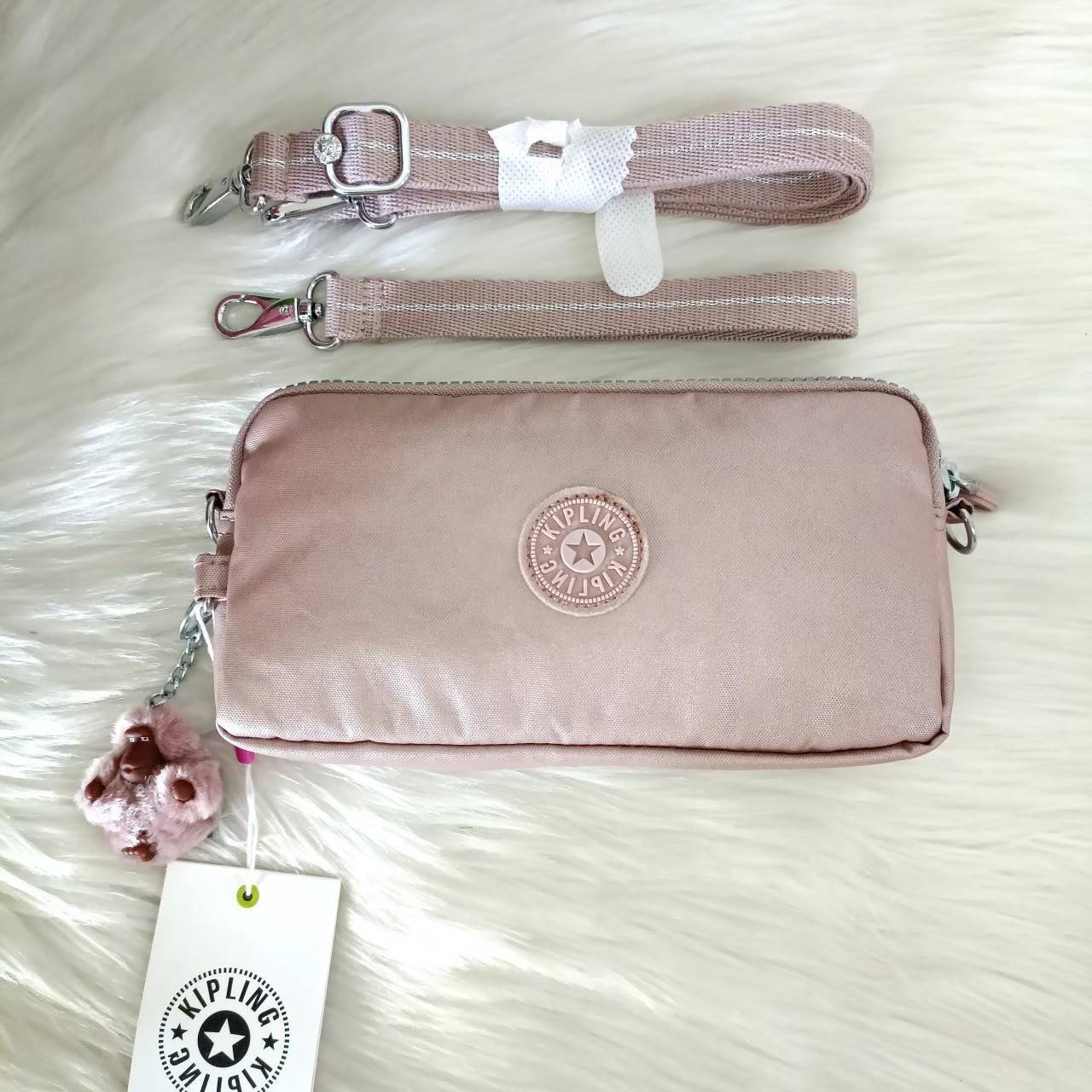 KIPLING กระเป๋าสตางค์ซิปรอบ ใบยาว Seoul up clutch & sling bag