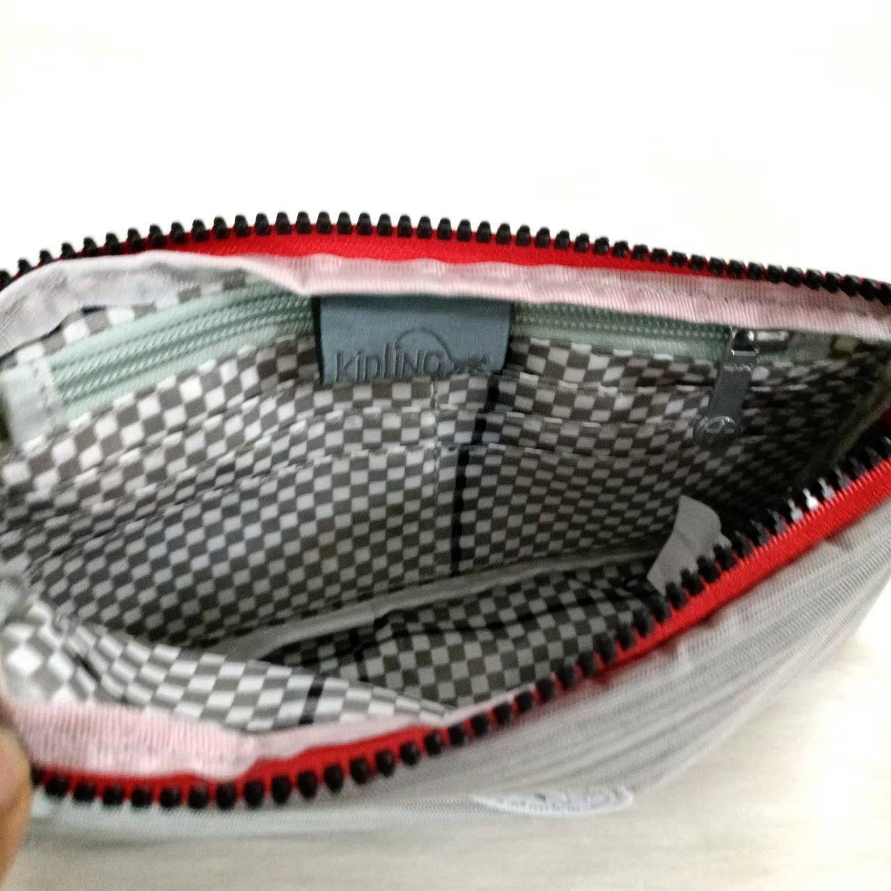 KIPLING กระเป๋าสตางค์ซิปรอบ ใบยาว Seoul up clutch & sling bag