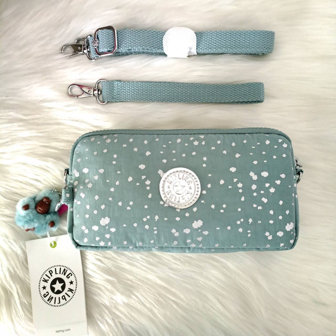 KIPLING กระเป๋าสตางค์ซิปรอบ ใบยาว Seoul up clutch & sling bag