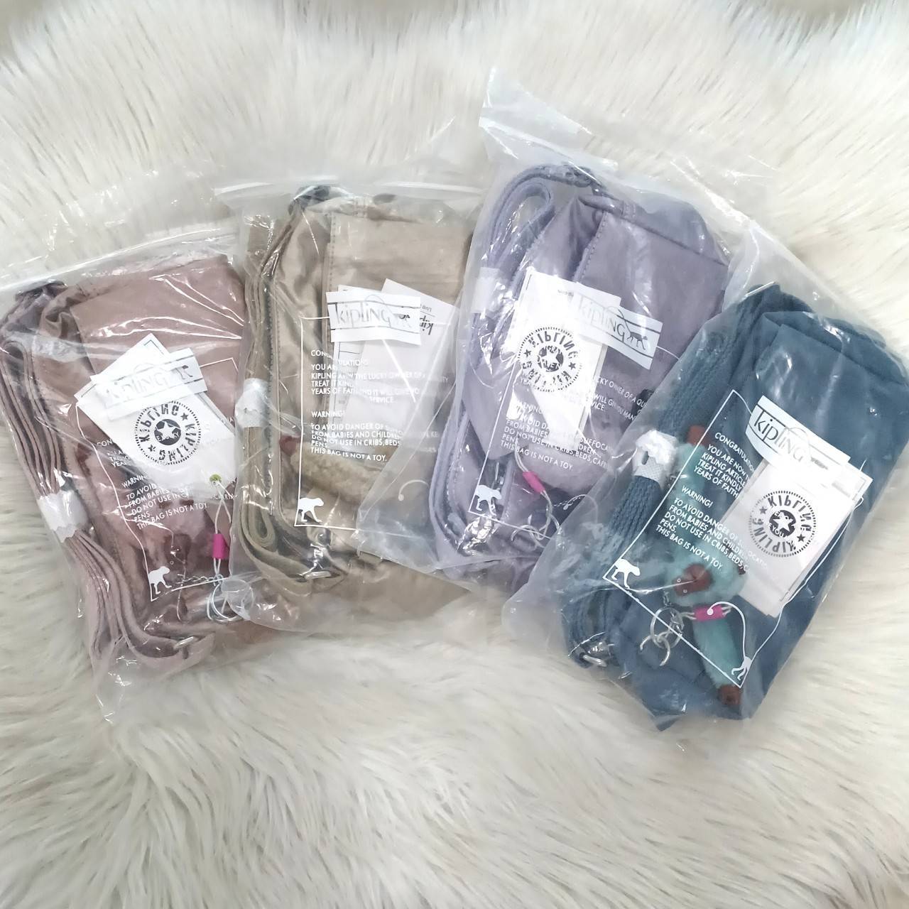 KIPLING คิปลิ้ง K16217 Seoul up sling bag คิปลิง กระเป๋าสะพายไหล่