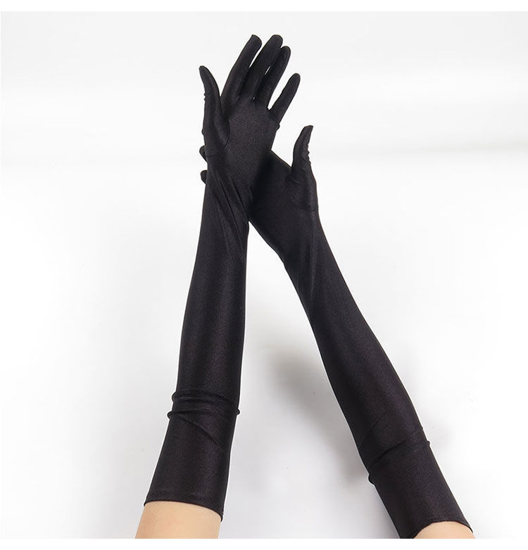 ถุงมือยาวสีดำ ถุงมือยาวเลยศอก ผ้าซานติน ยืดหยุ่นดี ฝามือกว้าง 9,ข้อมือ 8,ต้นแขน10 ซม. ยาว 52 ซม. แนะนำ 8 ขวบขึ้นไปจนถึงผู้ใหญ่