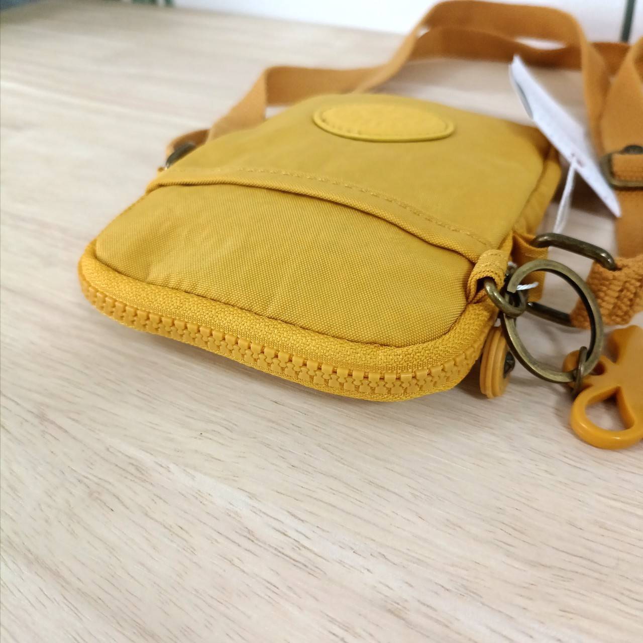 กระเป๋าใส่โทรศัพท์ KIPLING Tally crossbody กระเป๋าคิปลิ้ง