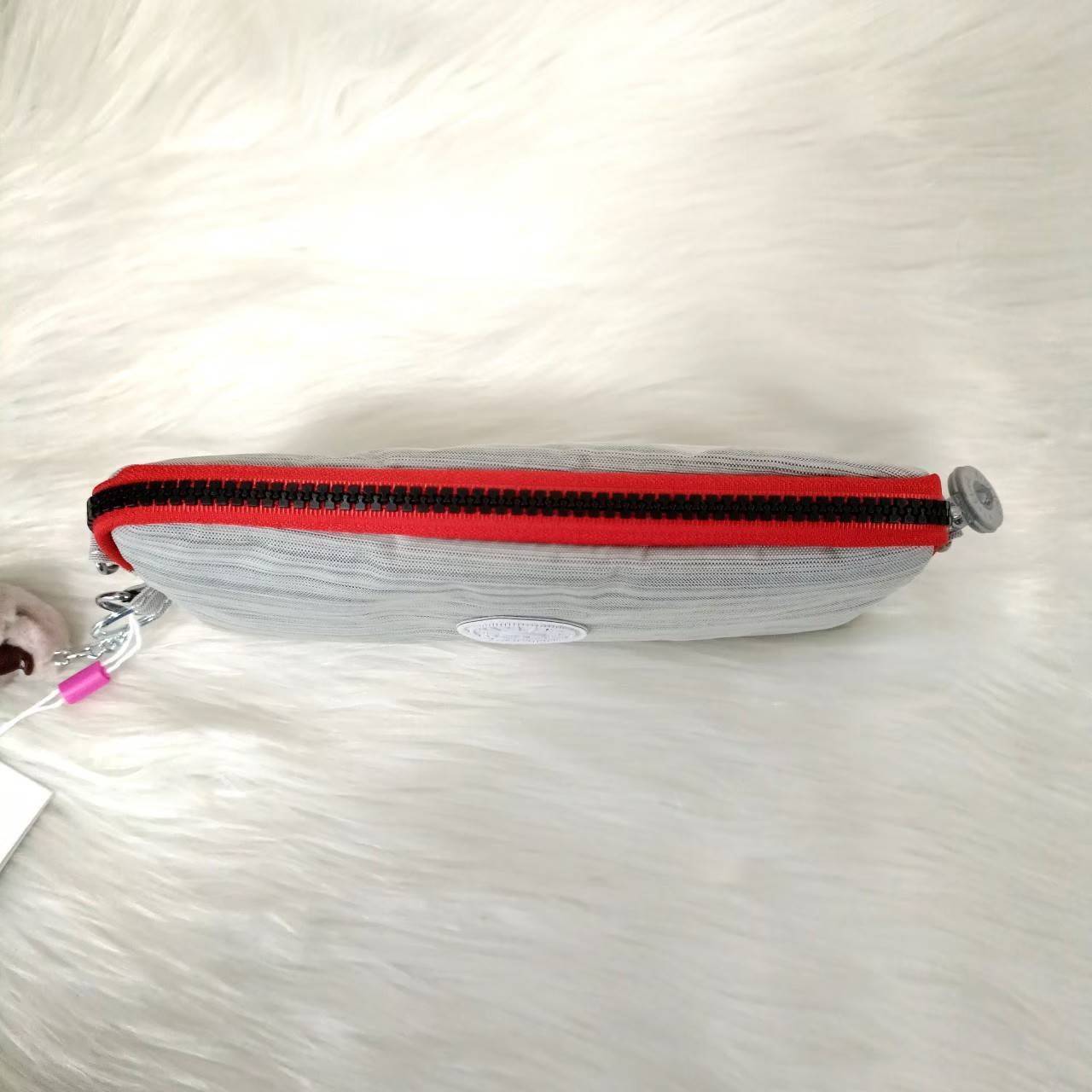 KIPLING กระเป๋าสตางค์ซิปรอบ ใบยาว Seoul up clutch & sling bag