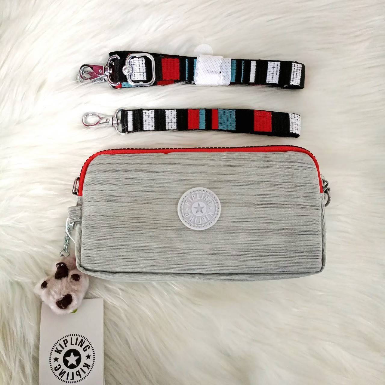 KIPLING กระเป๋าสตางค์ซิปรอบ ใบยาว Seoul up clutch & sling bag