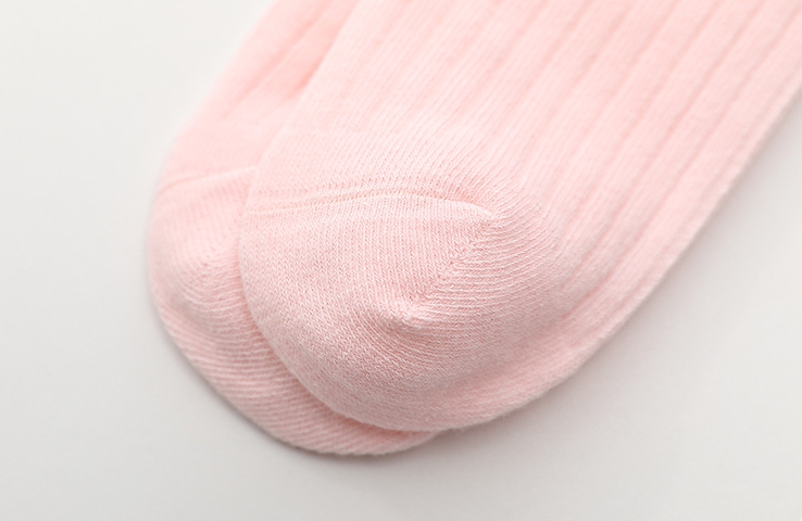 ถุงเท้ายาวเด็กผู้หญิงสีชมพู ติดโบว์น่ารัก สไตล์แฟชั่นเกาหลี ขนาดแบบฟรีไซส์ ยาว36 ซม.