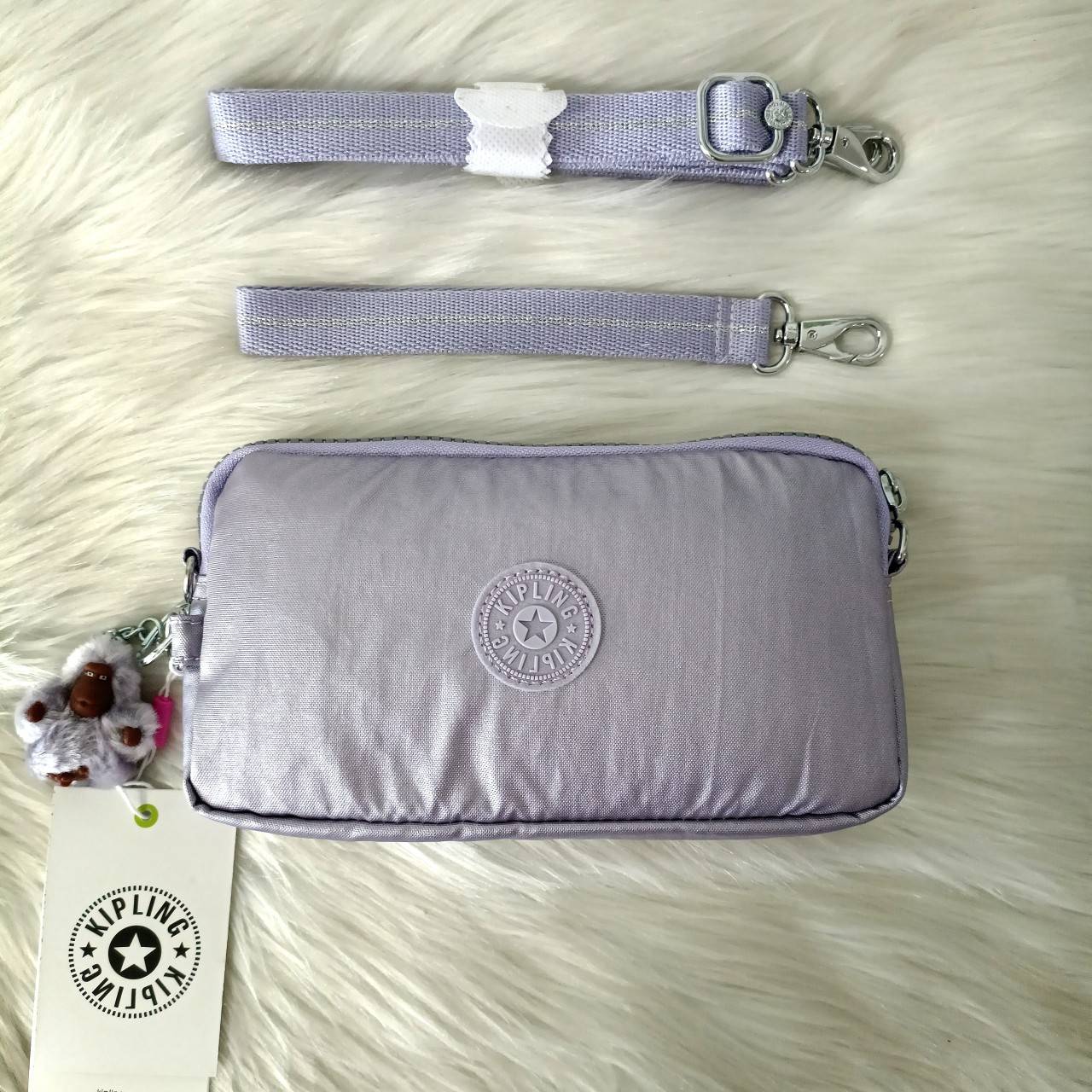 KIPLING กระเป๋าสตางค์ซิปรอบ ใบยาว Seoul up clutch & sling bag