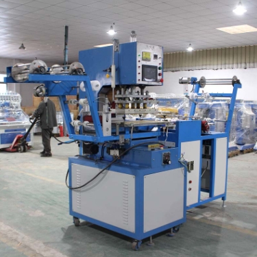 เครื่องปั๊มลายริบบิ้น ต่อเนื่อง DH-EM04 Heat Pressed Elastic Band Ribbon Embossing Machine
