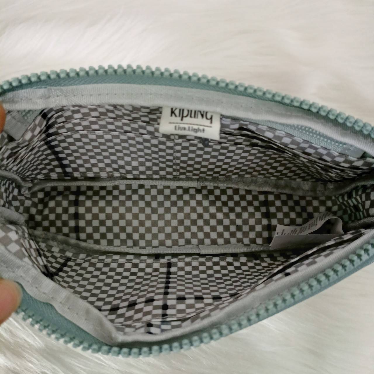 KIPLING กระเป๋าสตางค์ซิปรอบ ใบยาว Seoul up clutch & sling bag