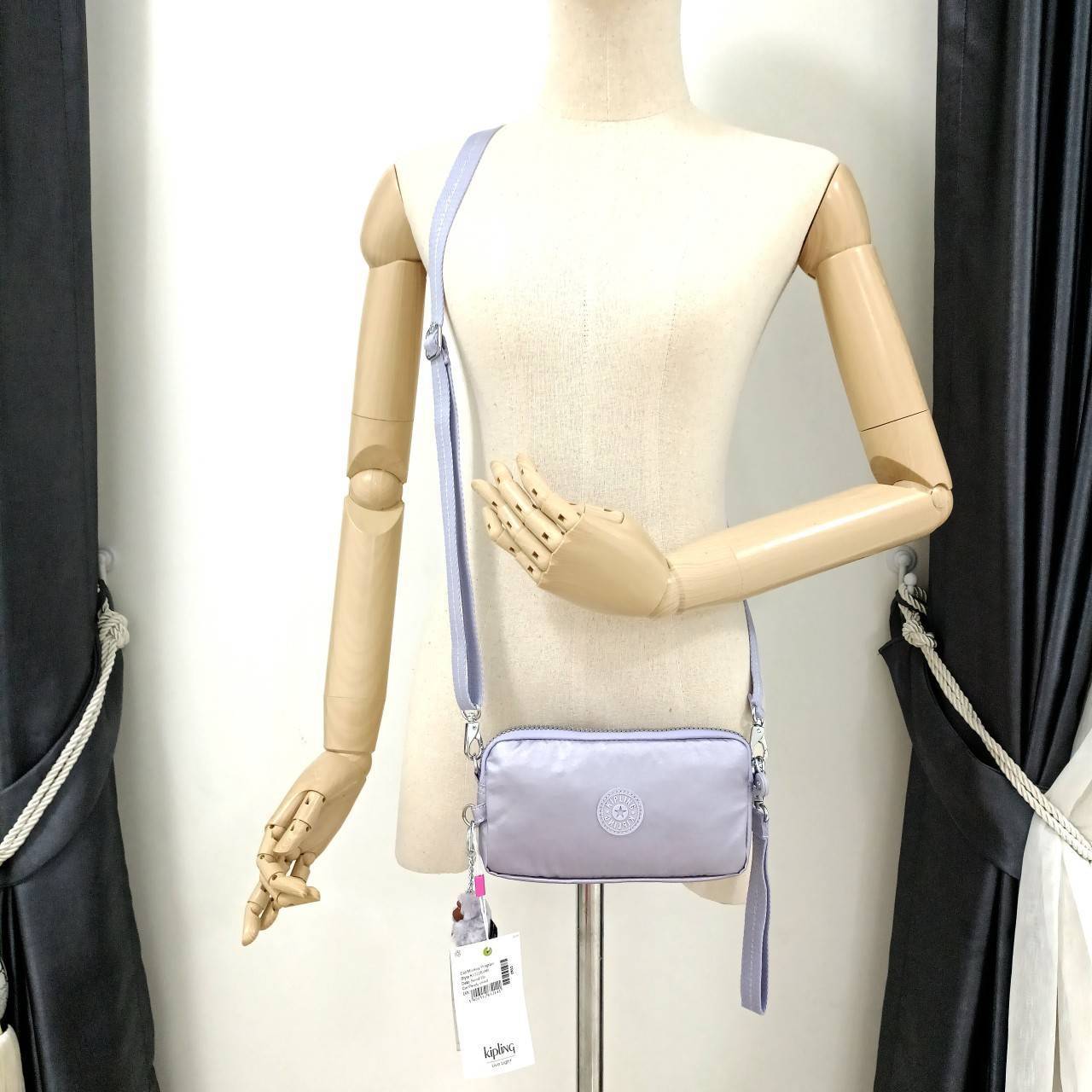 KIPLING กระเป๋าสตางค์ซิปรอบ ใบยาว Seoul up clutch & sling bag