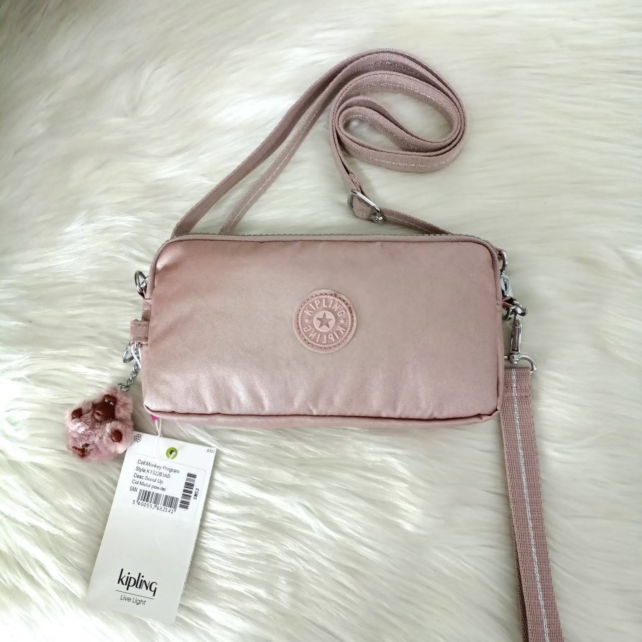 KIPLING กระเป๋าสตางค์ซิปรอบ ใบยาว Seoul up clutch & sling bag