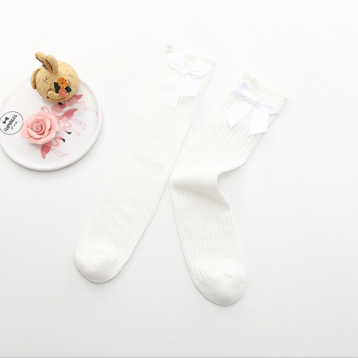 ถุงเท้ายาวเด็กผู้หญิงสีขาว ติดโบว์น่ารัก สไตล์แฟชั่นเกาหลี ขนาดแบบฟรีไซส์ ยาว 36 ซม.