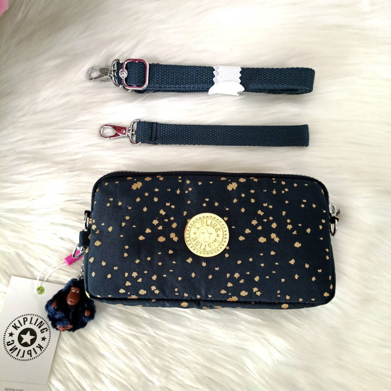 KIPLING กระเป๋าสตางค์ซิปรอบ ใบยาว Seoul up clutch & sling bag