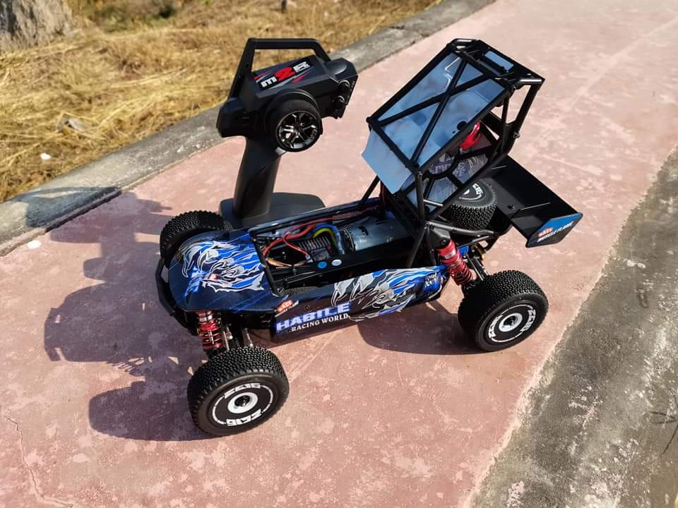 รถบังคับวิทยุ: Wltoys Item No:124018 มาตราส่วน: 1/12 ความเร็วสูงสุด: 60 กม. / ชม ระบบพลังงาน ESC: แผงวงจรรวม Motor:550 brushed motor