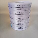 ป้ายคอเสื้อ เนื้อริบบิ้นซาติน 2.0 ซม. ริบบิ้นสีขาว 1 พิมพ์ดำ 5 ม้วน