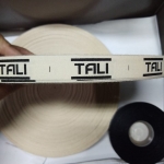 ป้ายคอเสื้อ เทปละเอียด 1.5 ซม.พิมพ์ดำ 1 ม้วน