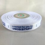 ป้ายคอเสื้อ เนื้อริบบิ้นซาติน 1.3 ซม. ริบบิ้นสีขาว 1 พิมพ์น้ำเงิน 1 ม้วน