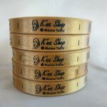 ป้ายคอเสื้อ เนื้อริบบิ้นซาติน 1.3 ซม. ริบบิ้นสีทอง พิมพ์ดำ 5 ม้วน