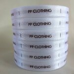 ป้ายคอเสื้อ เนื้อริบบิ้นซาติน 1.3 ซม. ริบบิ้นสีขาว 1 พิมพ์น้ำตาล 5 ม้วน