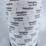 ป้ายคอเสื้อ เนื้อคอตต้อนก้างปลา 1.3 ซม.พิมพ์ดำ 1 ม้วน