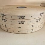 ป้ายคอเสื้อ เทปละเอียด 1.5 ซม.พิมพ์ดำ 4 ม้วน