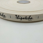 ป้ายคอเสื้อ เทปละเอียด 1.5 ซม.พิมพ์ดำ 1 ม้วน