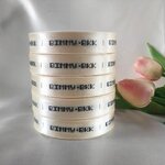 ป้ายคอเสื้อ เนื้อริบบิ้นซาติน 2 ซม. ริบบิ้นสีครีม S-2 พิมพ์ดำ 5 ม้วน