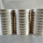 ป้ายคอเสื้อ เนื้อริบบิ้นซาติน 1.3 ซม. ริบบิ้นสีครีม S-2 พิมพ์น้ำตาล 30 ม้วน