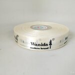 ป้ายคอเสื้อ เนื้อริบบิ้นซาติน 2 ซม. ริบบิ้นสีครีม S-2 พิมพ์ดำ 1 ม้วน