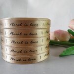 ป้ายคอเสื้อ เนื้อริบบิ้นซาติน 1.3 ซม. ริบบิ้นสี111A พิมพ์ดำ 5 ม้วน