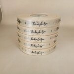 ป้ายคอเสื้อ เนื้อริบบิ้นซาติน 1.3 ซม. ริบบิ้นสีครีม S-2 พิมพ์ดำ 5 ม้วน