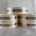 ป้ายคอเสื้อ เนื้อริบบิ้นซาติน 2.5 ซม. ริบบิ้นสีครีม s-2 พิมพ์ดำ 5 ม้วน