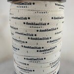 ป้ายคอเสื้อ เนื้อคอตต้อนก้างปลา 1.3 ซม.พิมพ์ดำ 1 ม้วน