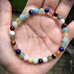 กำไลรวมหิน 🤍มูนสโตน ❤️โกเมน 💙อมาโซไนต์ 💛ไหมทอง 💙อความารีน 💚กรีนอเวนเจอรีน 💙ลาพิส 🧡ซันสโตน 💛ไทเกอร์อาย 🖤ลาบราโดไลท์