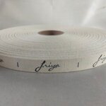 ป้ายคอเสื้อ เทปละเอียด 1.5 ซม.พิมพ์ดำ 1 ม้วน