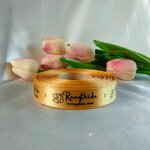 ป้ายคอเสื้อ เนื้อริบบิ้นซาติน 2.0 ซม. ริบบิ้นทอง 103 พิมพ์ดำ 1 ม้วน