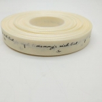 ป้ายคอเสื้อ เนื้อริบบิ้นซาติน 1.3 ซม. ริบบิ้นสีครีม S-2 พิมพ์ดำ 1 ม้วน